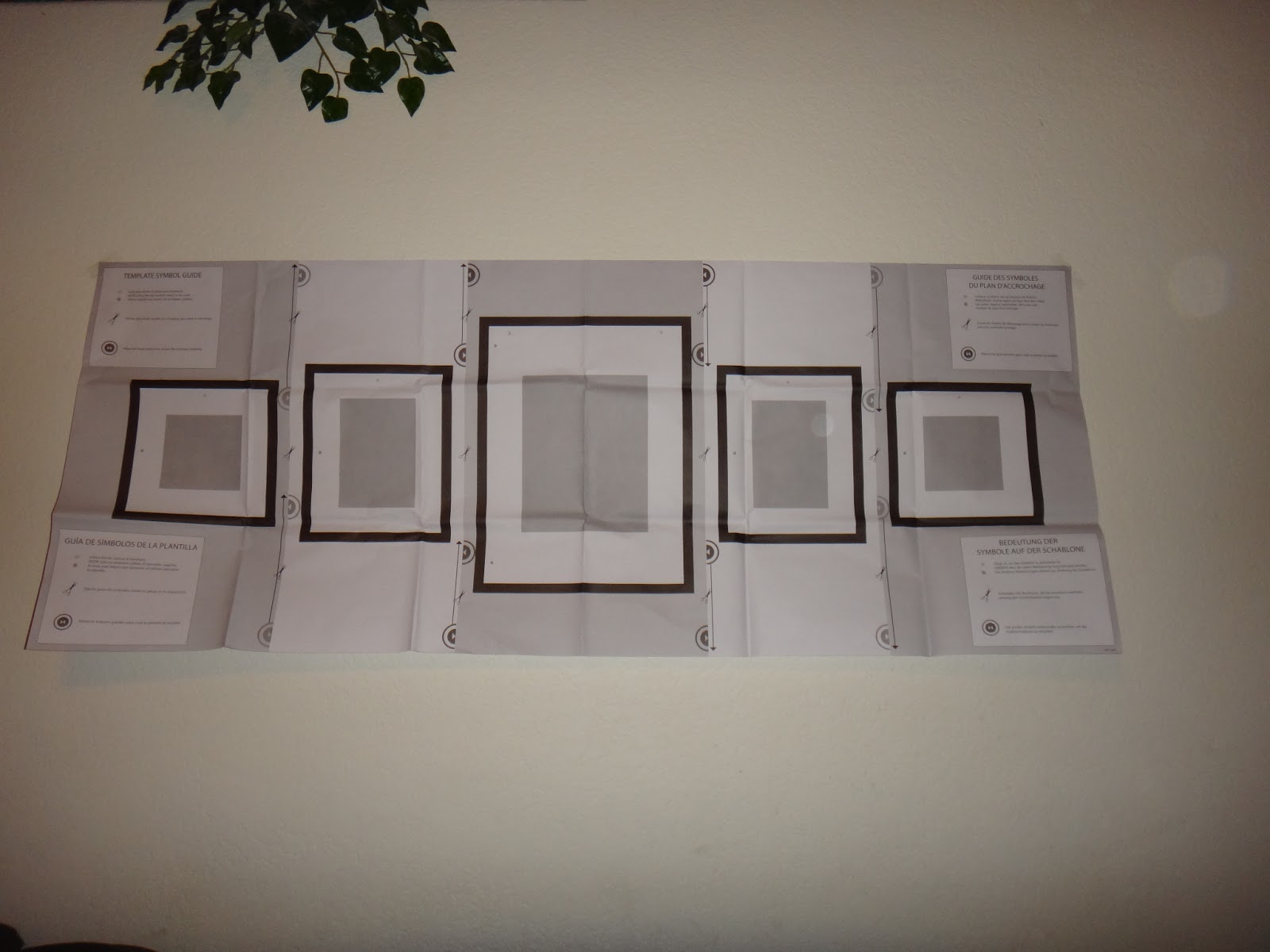 5 Photo Frames On Wall