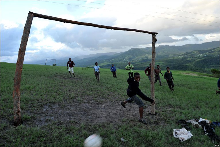 Children Playing Football In Africa