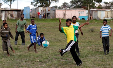 Children Playing Football In Africa