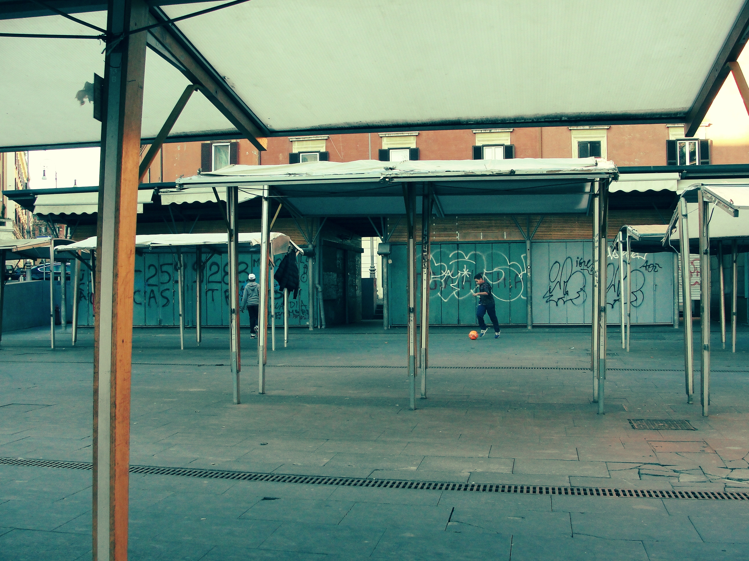 Children Playing Football In The Street