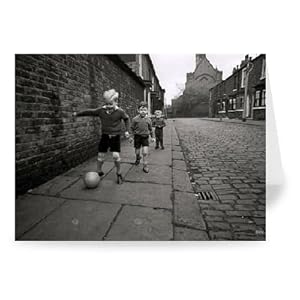 Children Playing Football In The Street