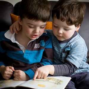 Children Reading Books Together