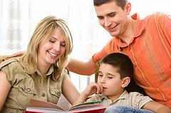 Children Reading Books With Parents