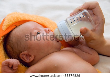 Feeding Baby Bottle In Bed