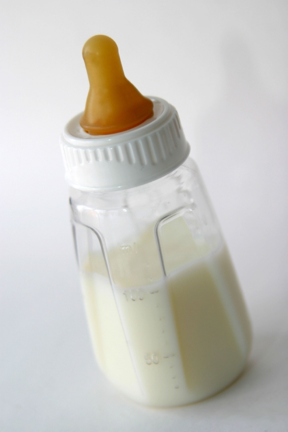 Feeding Baby Bottle In Cot