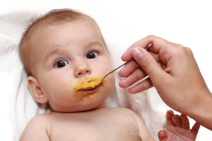 Feeding Baby Milk With Spoon