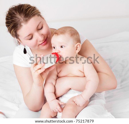 Mom Feeding Baby Milk