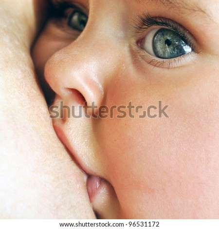 Mother Feeding Baby Milk