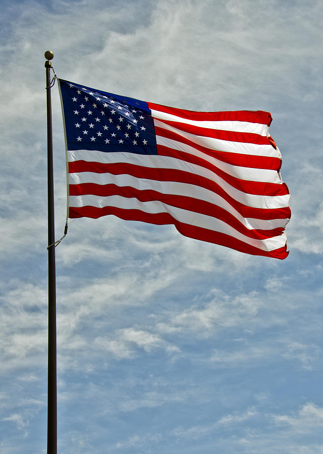 Us Flag Waving In The Wind